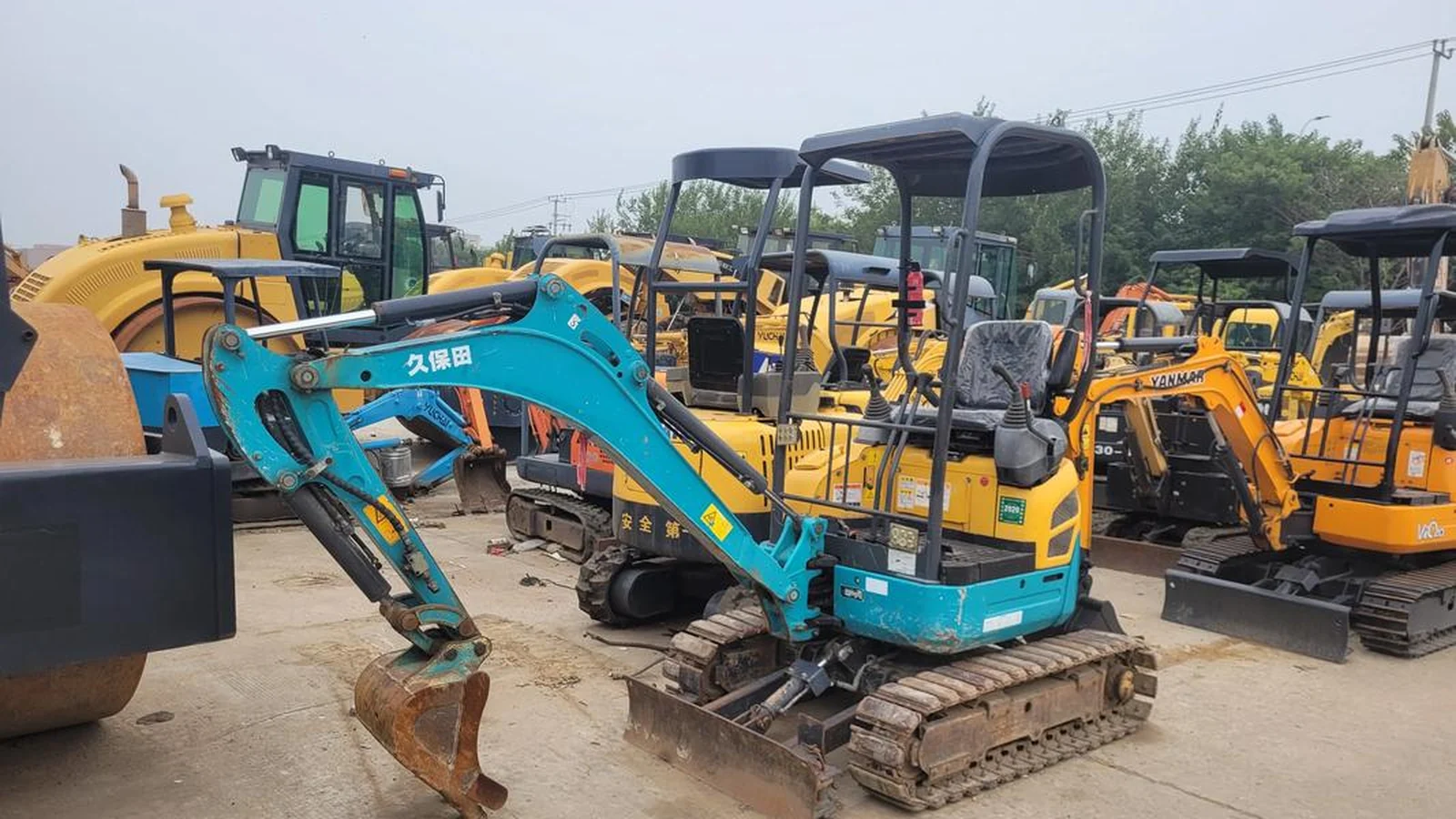 North China yard — used excavators ready for export